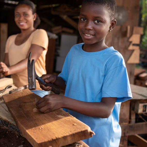 medium-shot-kid-with-hammer-hitting-nail_23-2148931068 (1)